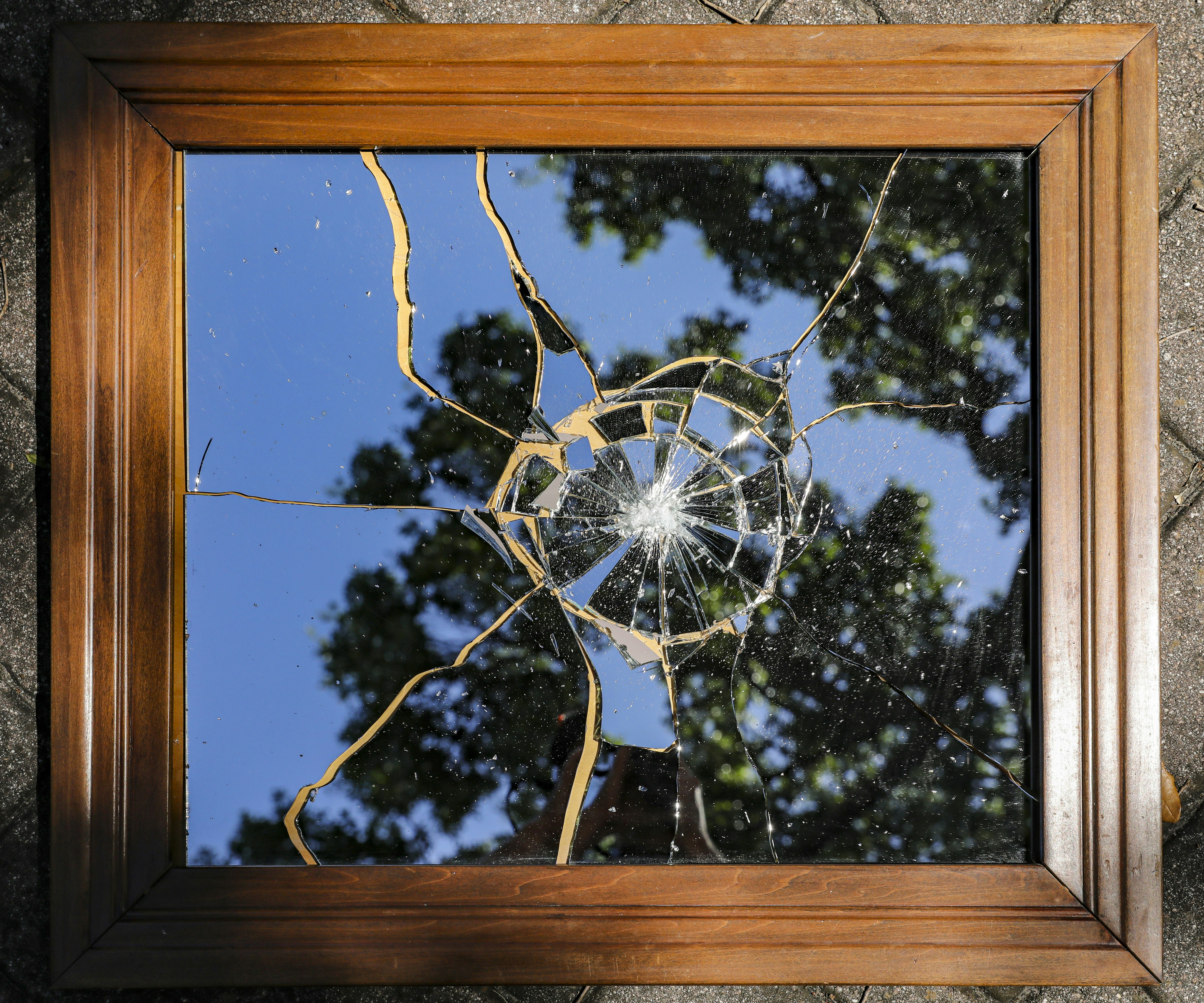Instead of taking this to Goodwill like a good boy I broke this mirror to illustrate how fragile our world and emotions are.